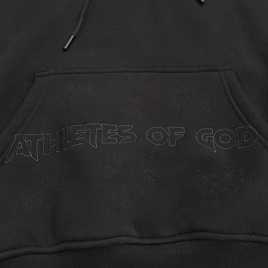 Close-up of the tonal Athletes of God embroidery on the pocket